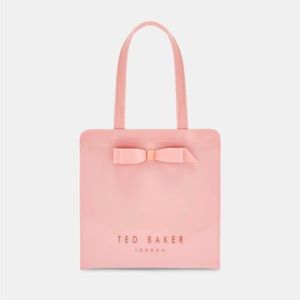 Closet clearing! New in original packaging.  Icon bag w/rose gold lettering.